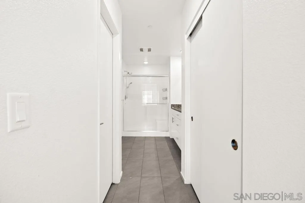 347 Sweet Place Fallbrook, CA 92028 - Photo 8 of 33 a bathroom with a bathtub and a shower