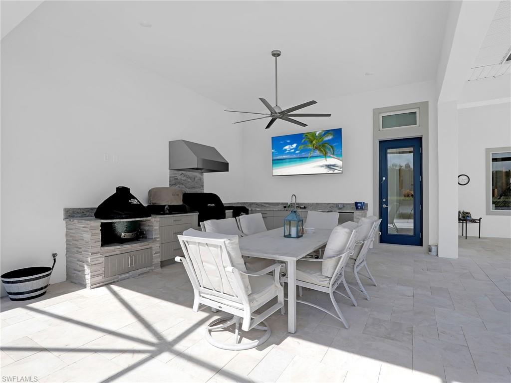 15432 Turin Drive Naples, FL 34114 - Photo 15 of 45 a view of a dining room with furniture