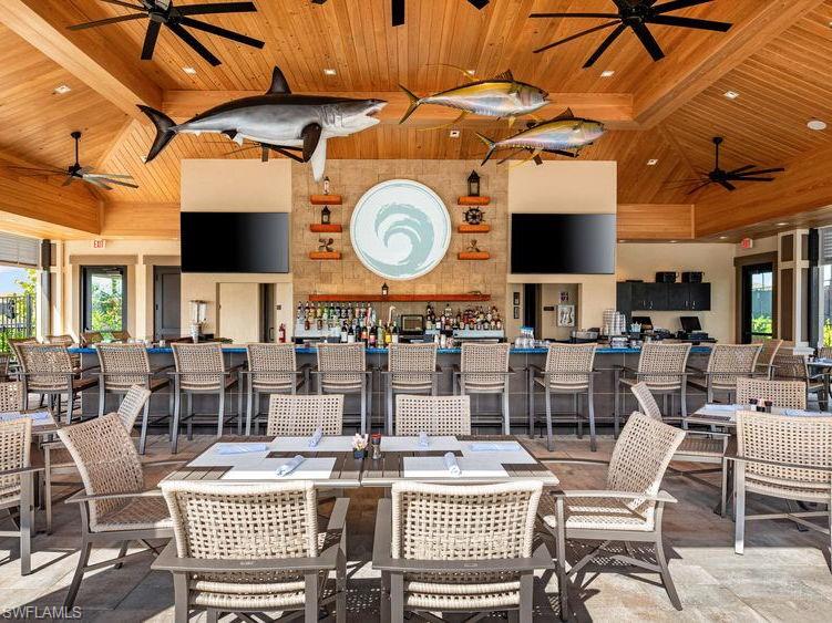 15432 Turin Drive Naples, FL 34114 - Photo 38 of 45 a view of a dining room and livingroom