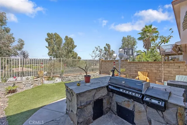 a view of a chairs and table on the terrace