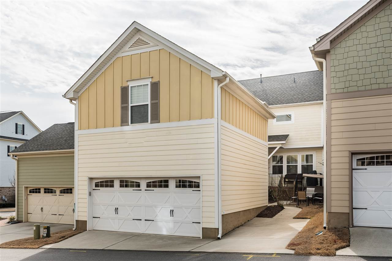 1413 Van Page Boulevard Raleigh, NC 27607 - Photo 24 of 25 CONVENIENT ALLEY WAY ACCESS AND ENTRANCE TO DOUBLE CAR GARAGE BEHIND THE HOME. BACK EXTERIOR
