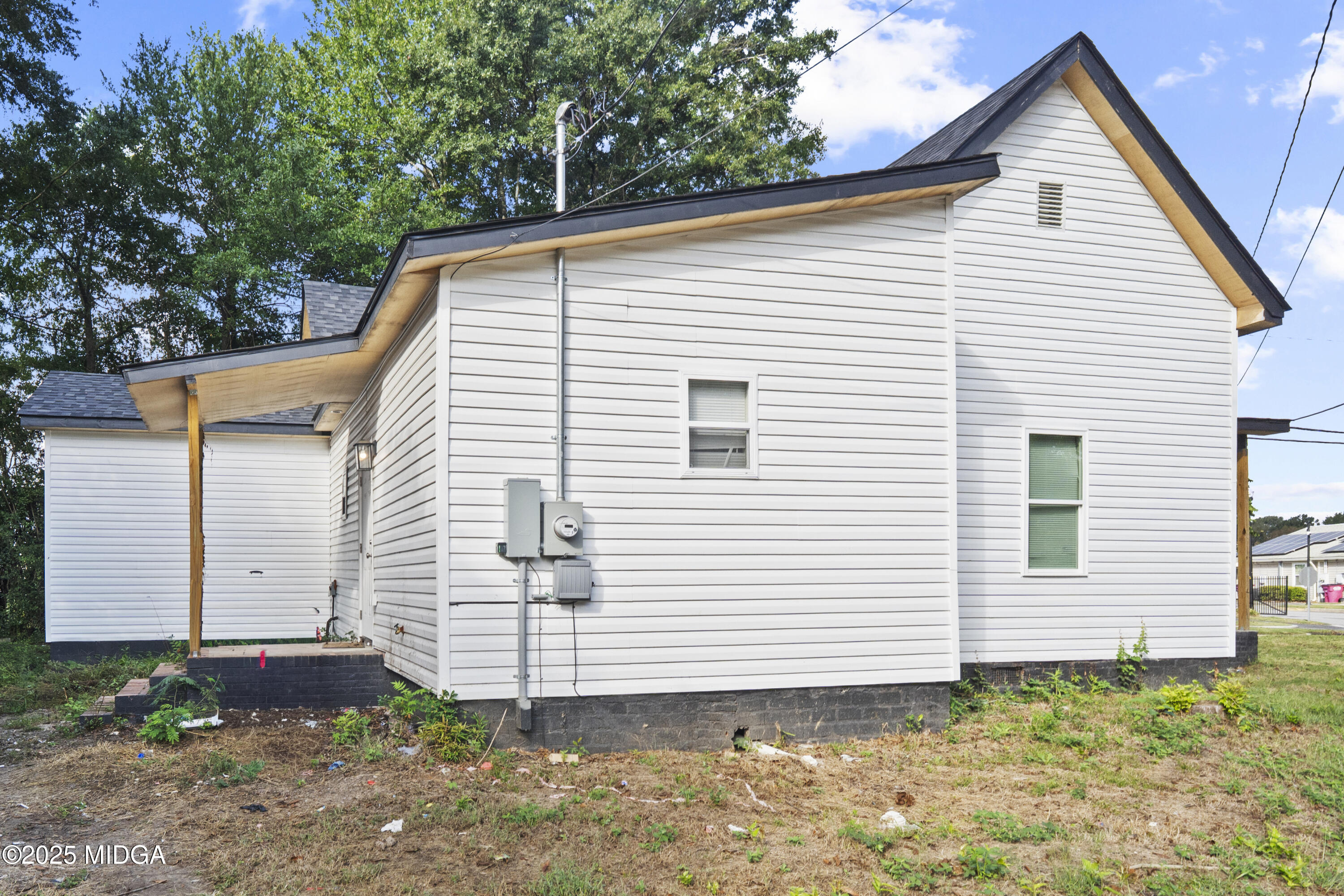 974 Tenney Avenue Macon, GA 31201 - Photo 3 of 6 a view of a house with a yard