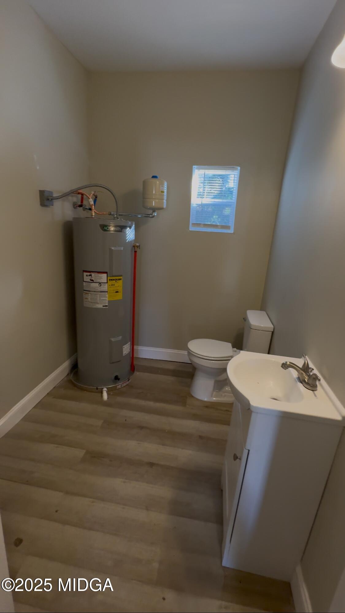 974 Tenney Avenue Macon, GA 31201 - Photo 6 of 6 a bathroom with a sink and a toilet
