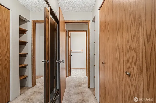 a bathroom with a sink a toilet and vanity