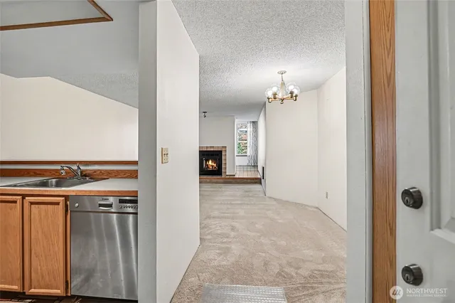 a kitchen with a stove and a refrigerator
