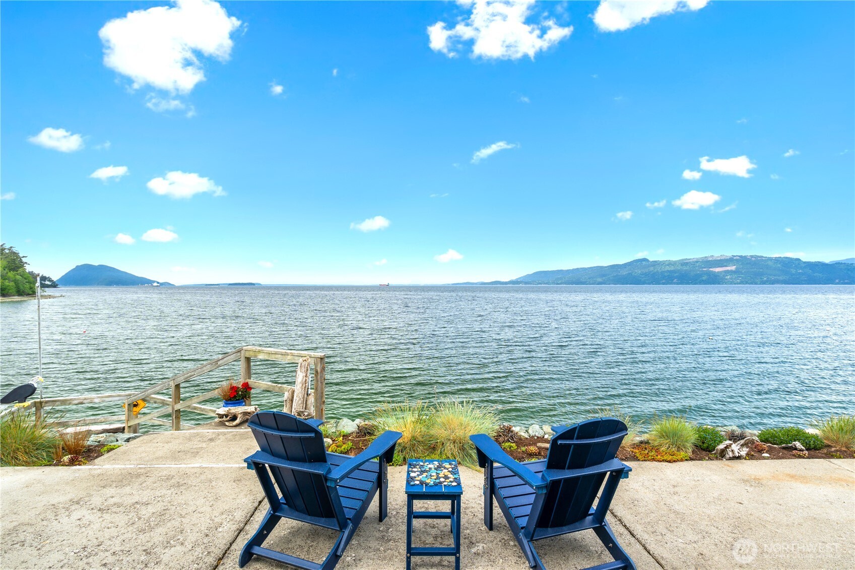 9609 Samish Island Road Bow, WA 98232 - Photo 4 of 33 a view of a terrace with chairs