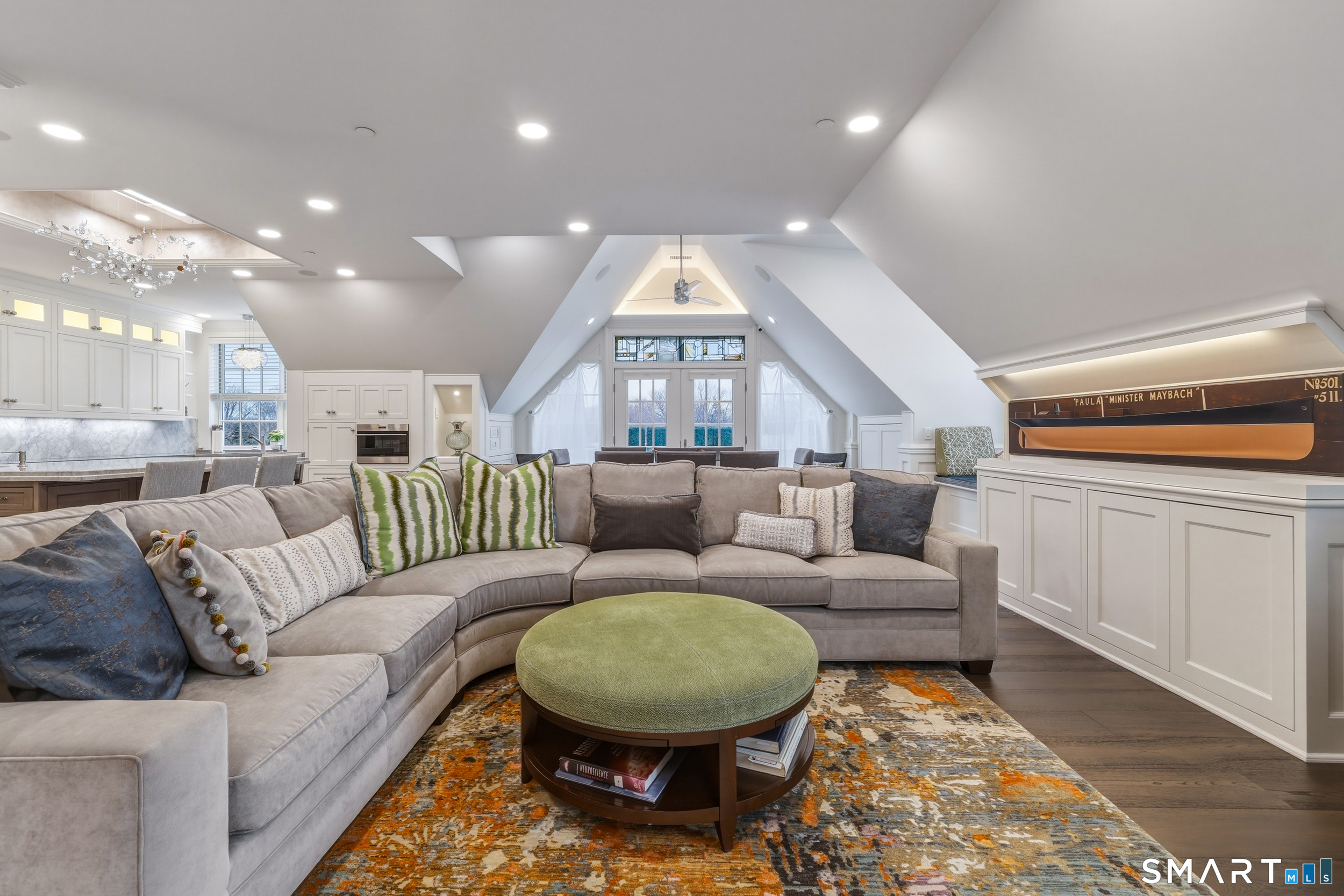 66 High Street, Unit 38 Guilford, CT 06437 - Photo 13 of 40 a living room with furniture and a rug
