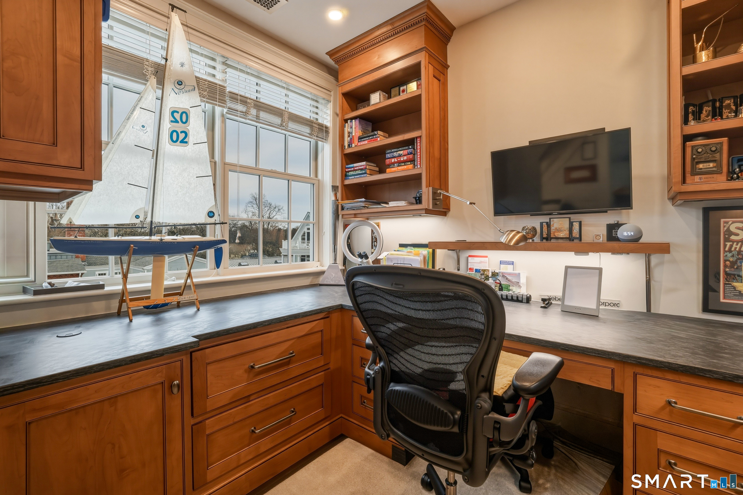 66 High Street, Unit 38 Guilford, CT 06437 - Photo 21 of 40 a dining hall with stainless steel appliances granite countertop a stove and a sink