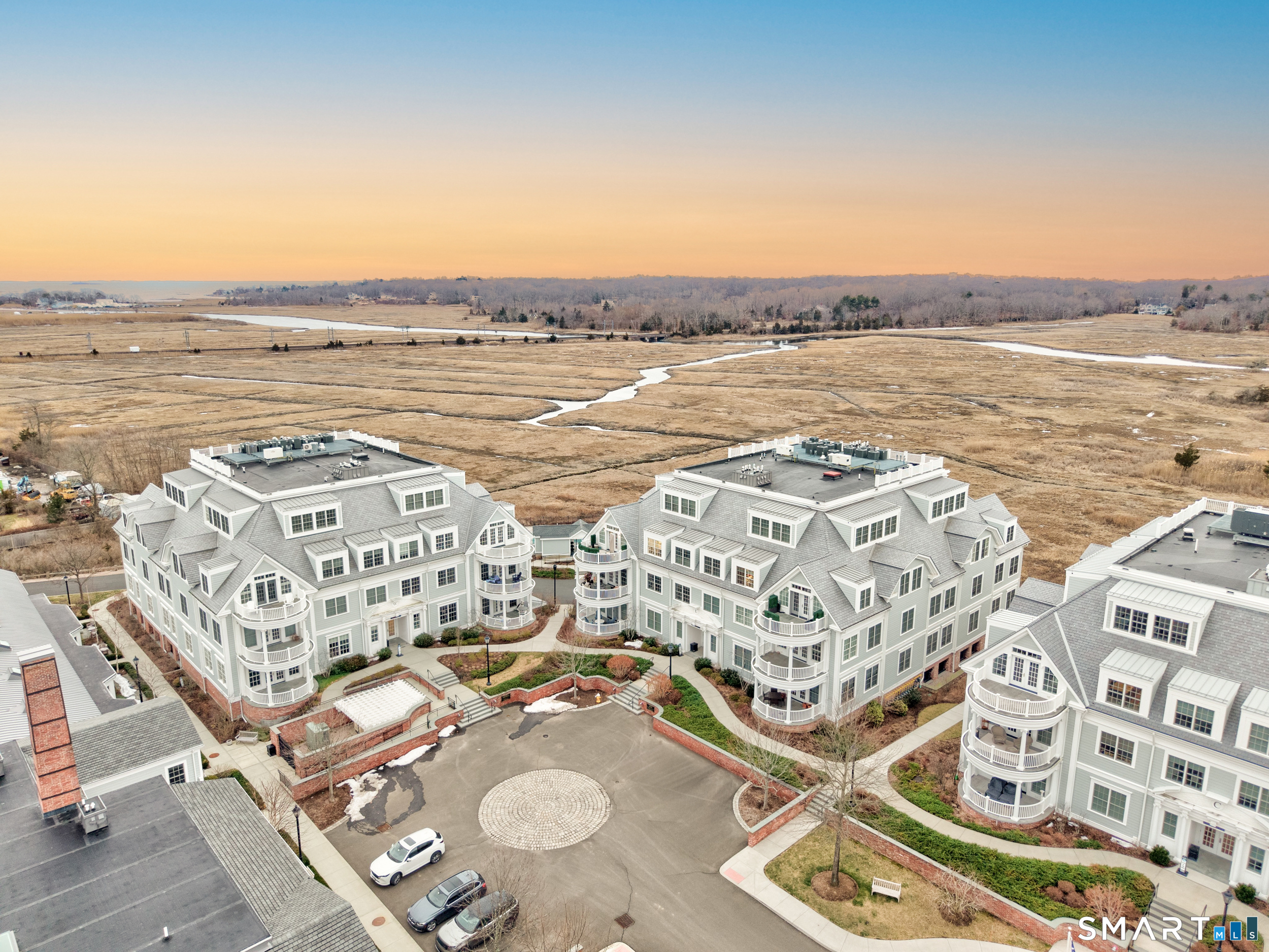 66 High Street, Unit 38 Guilford, CT 06437 - Photo 3 of 40 an aerial view of residential building with ocean view