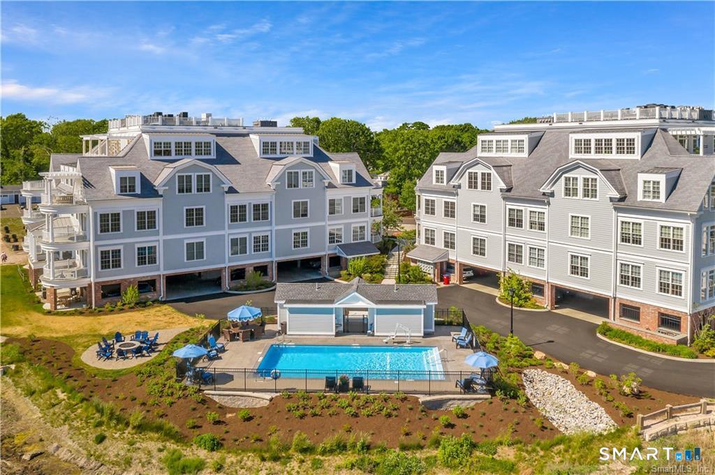 66 High Street, Unit 38 Guilford, CT 06437 - Photo 35 of 40 a view of a building with many windows