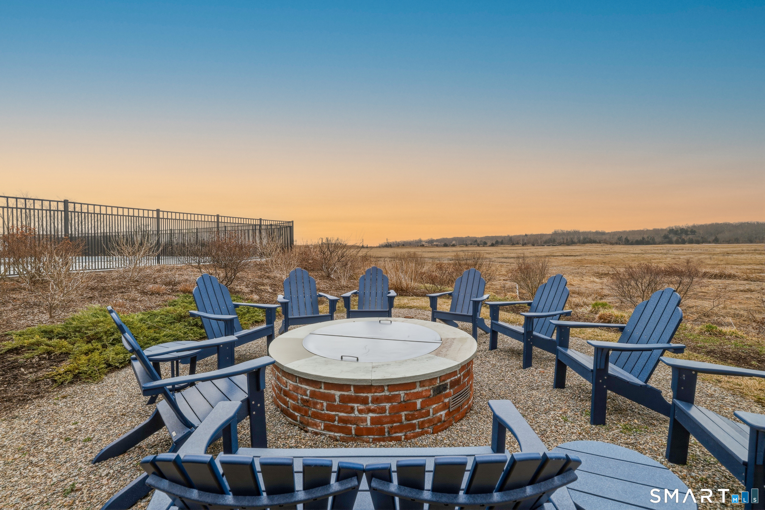 66 High Street, Unit 38 Guilford, CT 06437 - Photo 36 of 40 a terrace with outdoor seating and city view