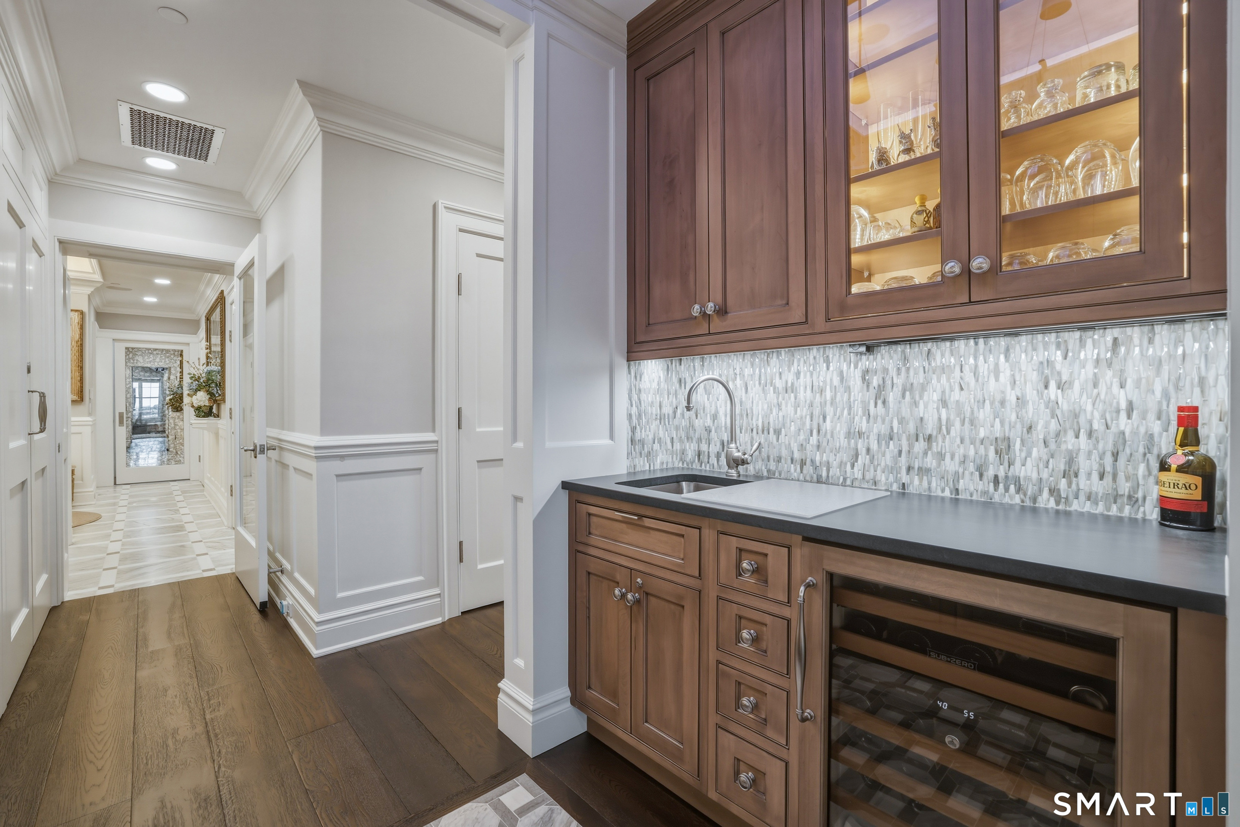 66 High Street, Unit 38 Guilford, CT 06437 - Photo 5 of 40 a kitchen with stainless steel appliances granite countertop a stove and cabinets