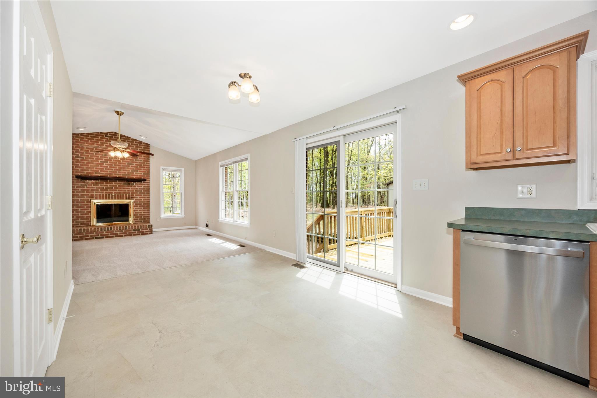 10393 Liberty Road Frederick, MD 21701 - Photo 24 of 47 a view of an empty room with window and cabinet