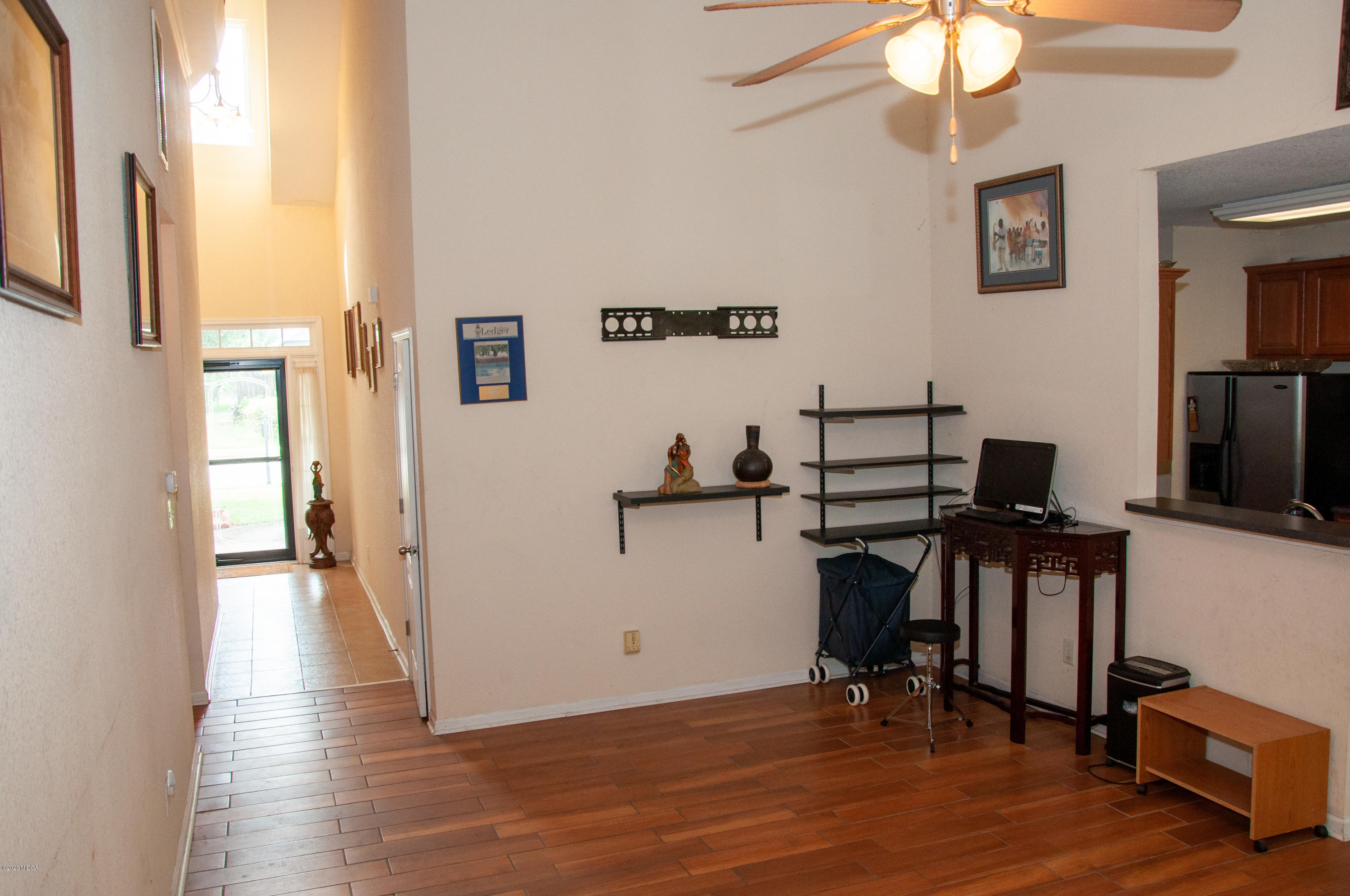 480 Bob White Road Macon, GA 31216 - Photo 11 of 28 a view of a workspace with furniture and a window