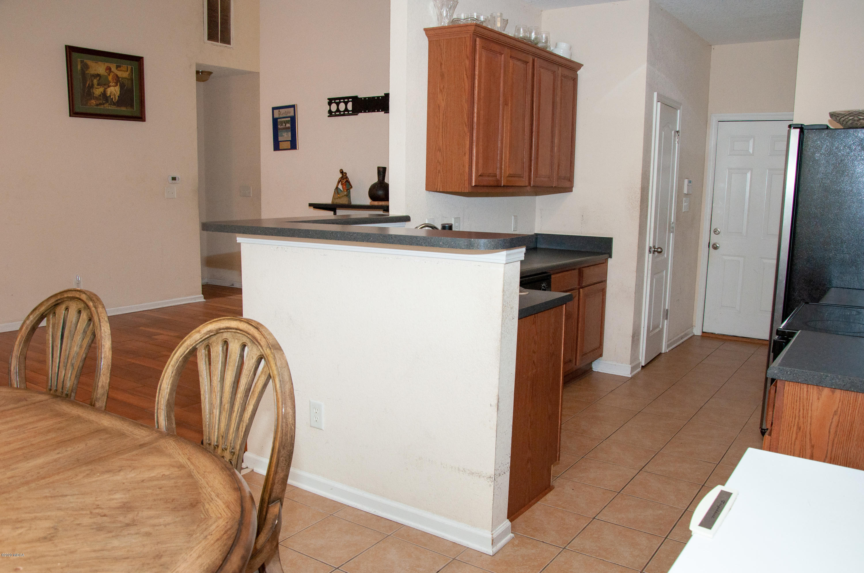 480 Bob White Road Macon, GA 31216 - Photo 15 of 28 a kitchen with stainless steel appliances granite countertop a refrigerator a stove a sink and a microwave