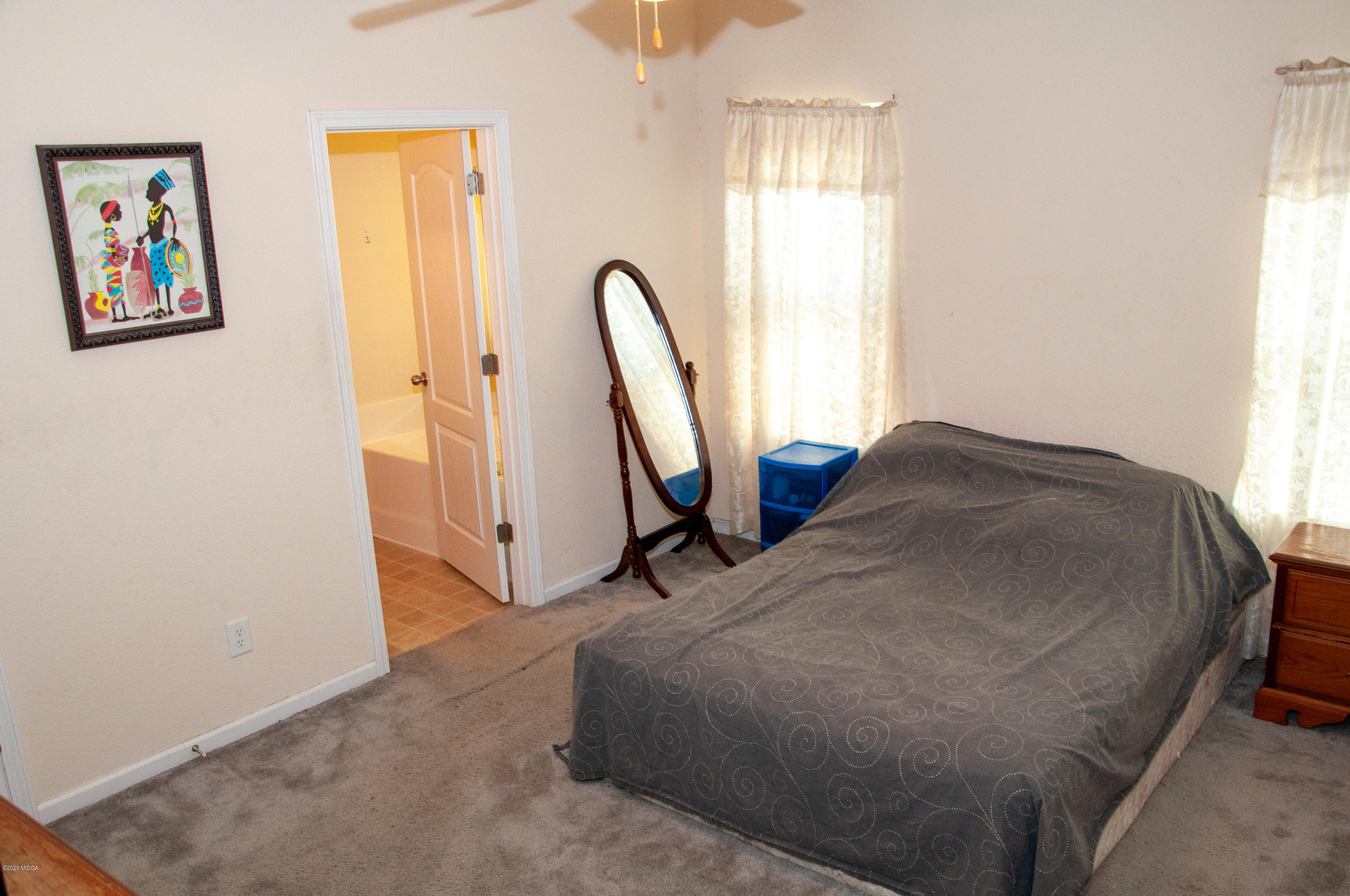480 Bob White Road Macon, GA 31216 - Photo 18 of 28 a view of a bedroom with furniture and a window