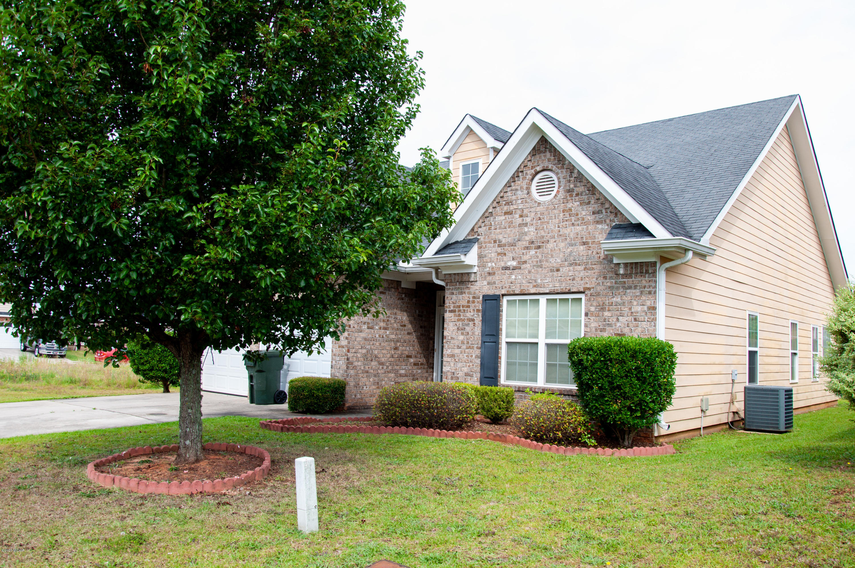 480 Bob White Road Macon, GA 31216 - Photo 3 of 28 a front view of a house with a yard
