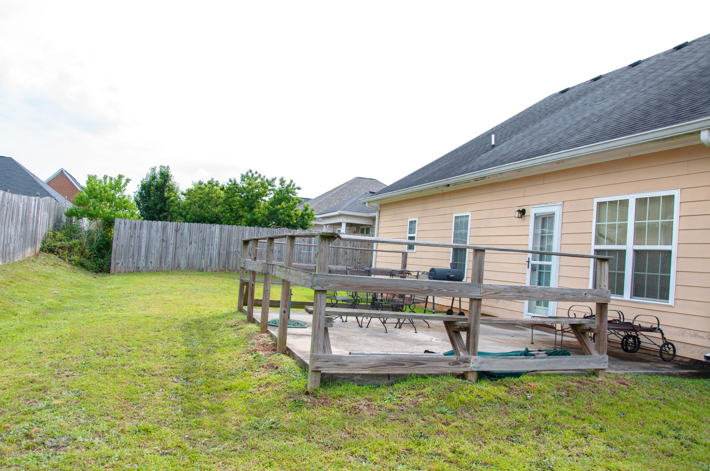 480 Bob White Road Macon, GA 31216 - Photo 27 of 28 a swimming pool with outdoor seating and yard