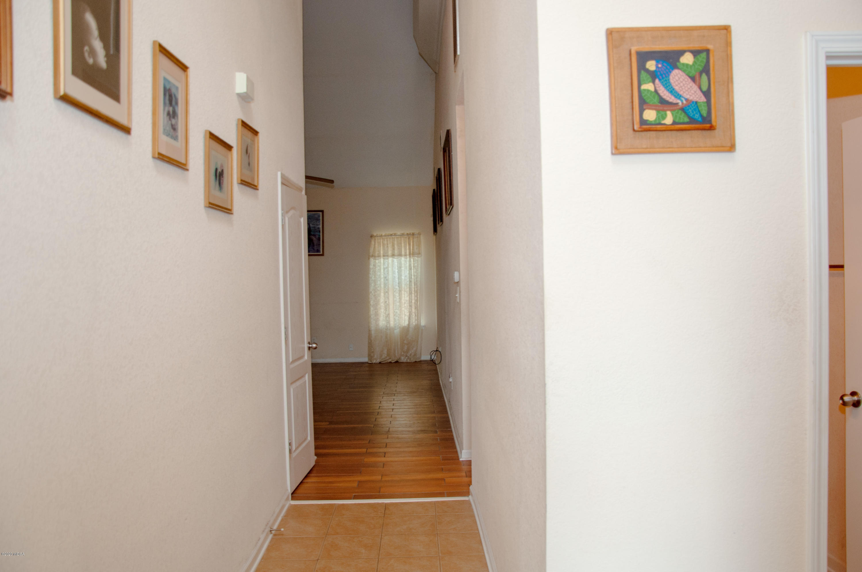 480 Bob White Road Macon, GA 31216 - Photo 4 of 28 a view of a hallway with wooden floor
