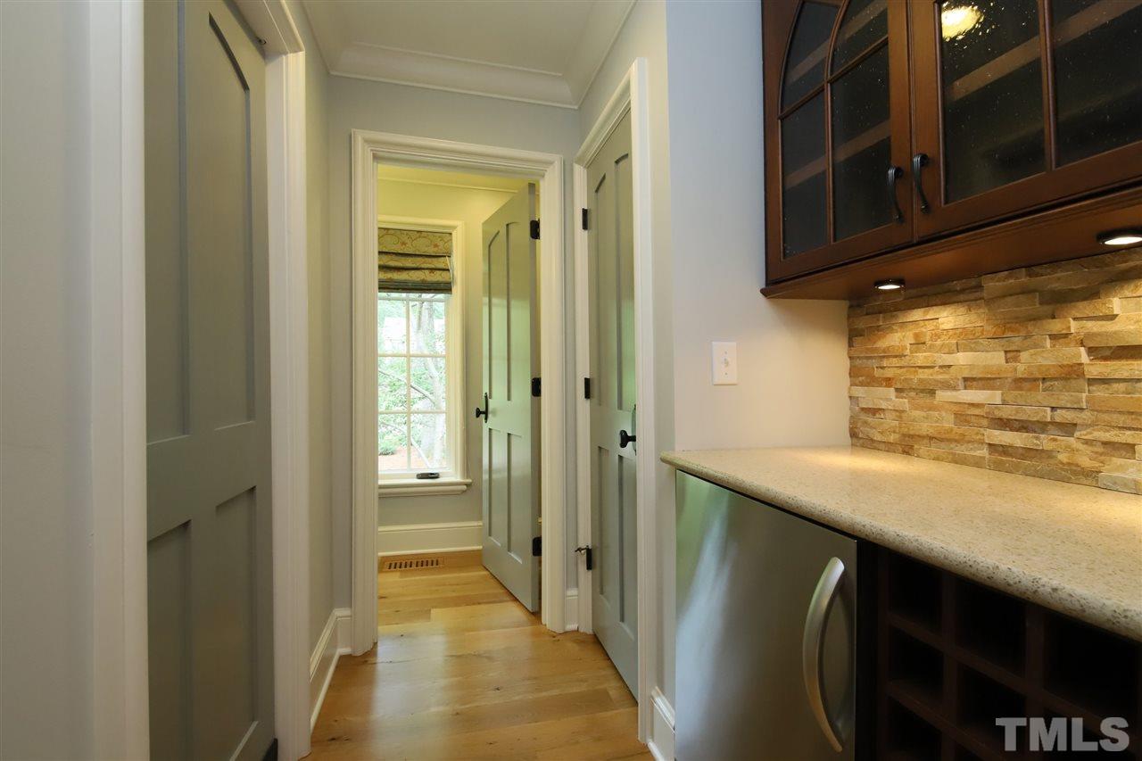 3411 Dover Road Durham, NC 27707 - Photo 12 of 29 Small refrigerator, cabinetry and counter space plus wine bottle storage