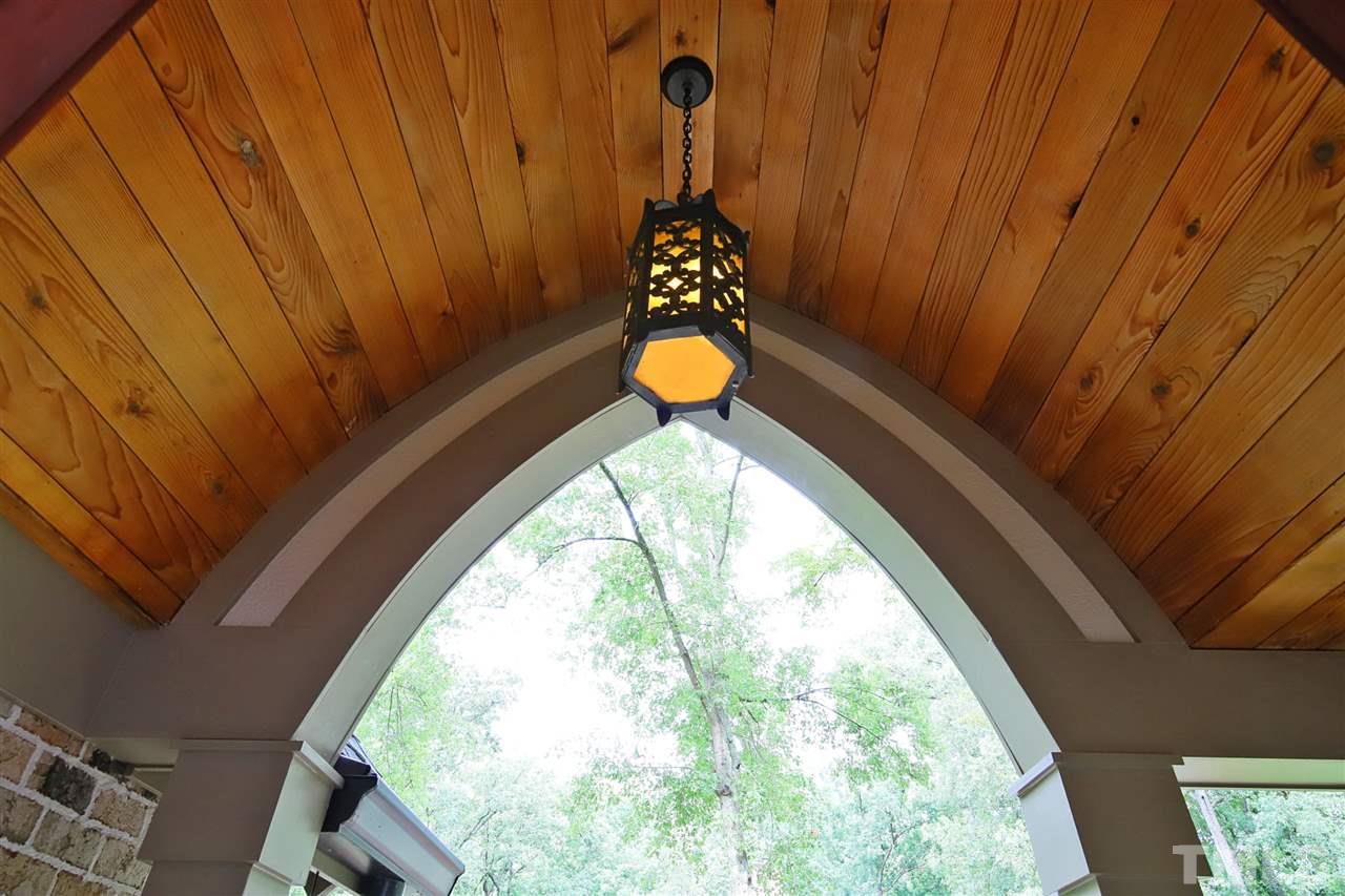 3411 Dover Road Durham, NC 27707 - Photo 3 of 29 The front porch ceiling detail is sure to delight any visitor to the home and sets the stage for the delightful interior.