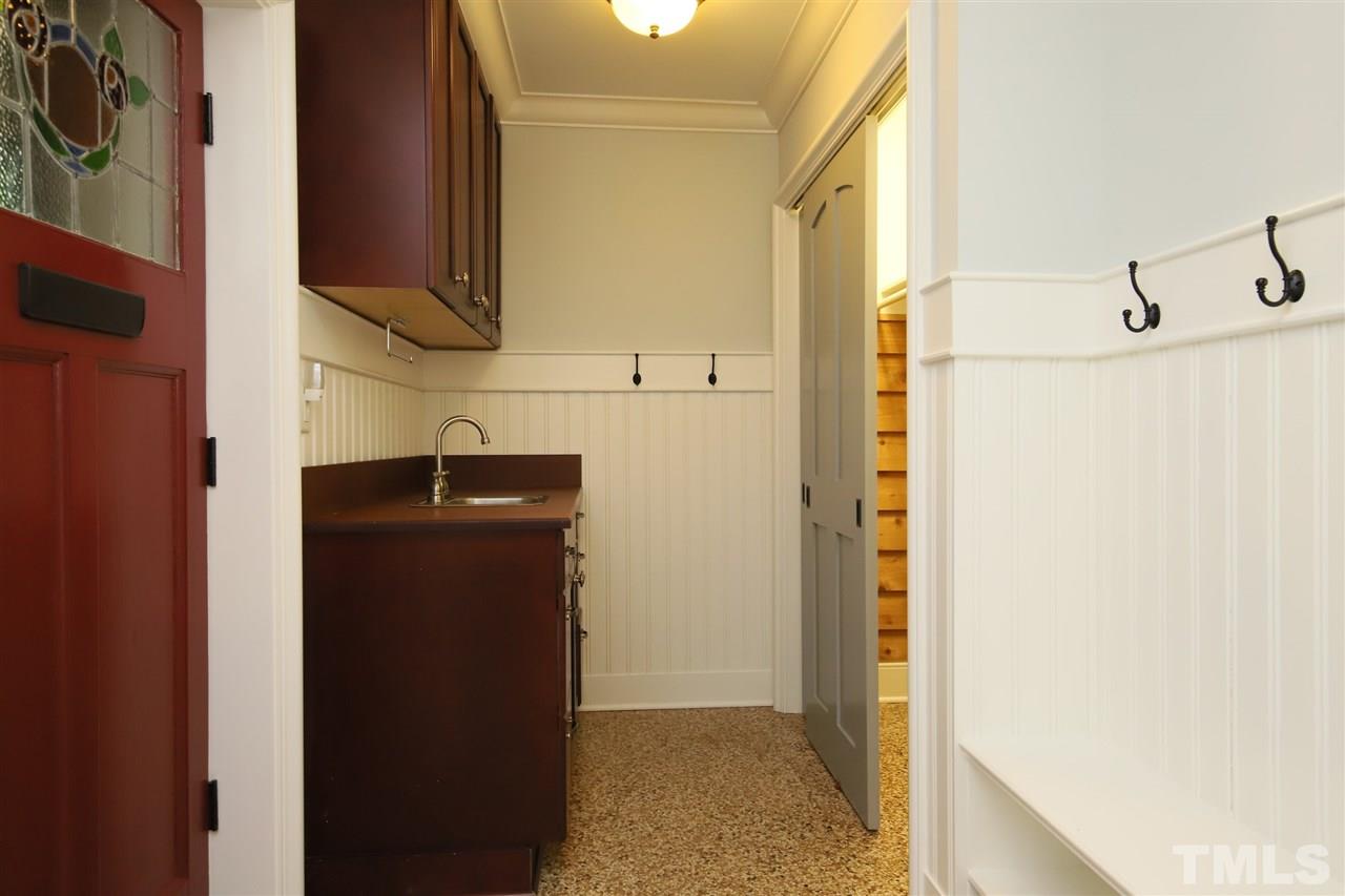 3411 Dover Road Durham, NC 27707 - Photo 21 of 29 Entrance to rear of the home comes in thru the mudroom, complete w/sink, hooks for jackets & big closet. Also on this level but not pictured are 2 bedrms, a divided bath & 2 storage rms. One of the storage rms could be suitable for wine storage.