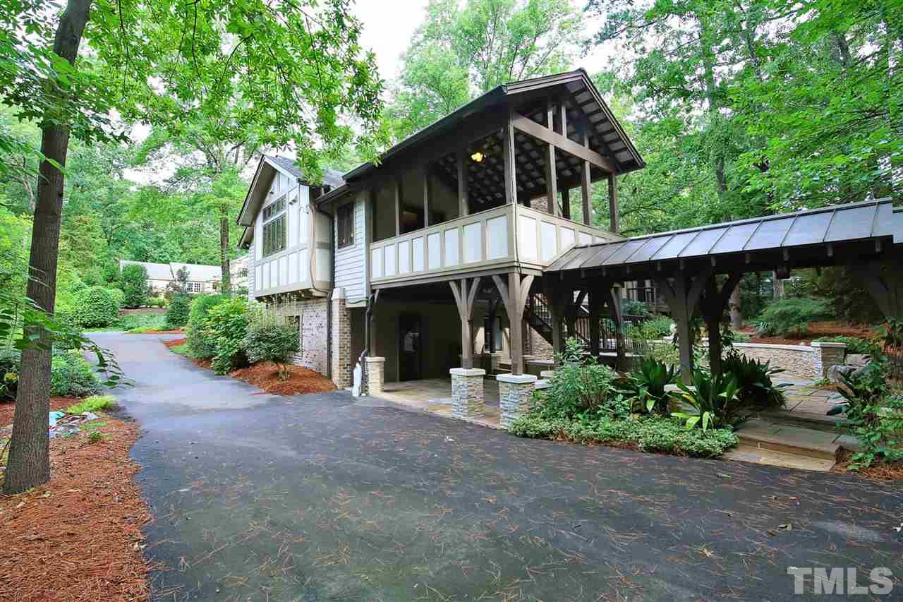 3411 Dover Road Durham, NC 27707 - Photo 5 of 29 Photo illustrates the covered access from the garage to the lower level of the home.