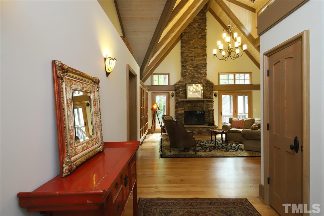 3411 Dover Road Durham, NC 27707 - Photo 7 of 29 As you enter the front door into the foyer, you are able to see straight back into the living room and to the right, you have a view into the formal dining room.