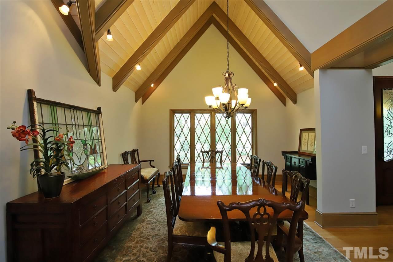 3411 Dover Road Durham, NC 27707 - Photo 9 of 29 The large dining room faces the front of the house and is open to the foyer and the living room.