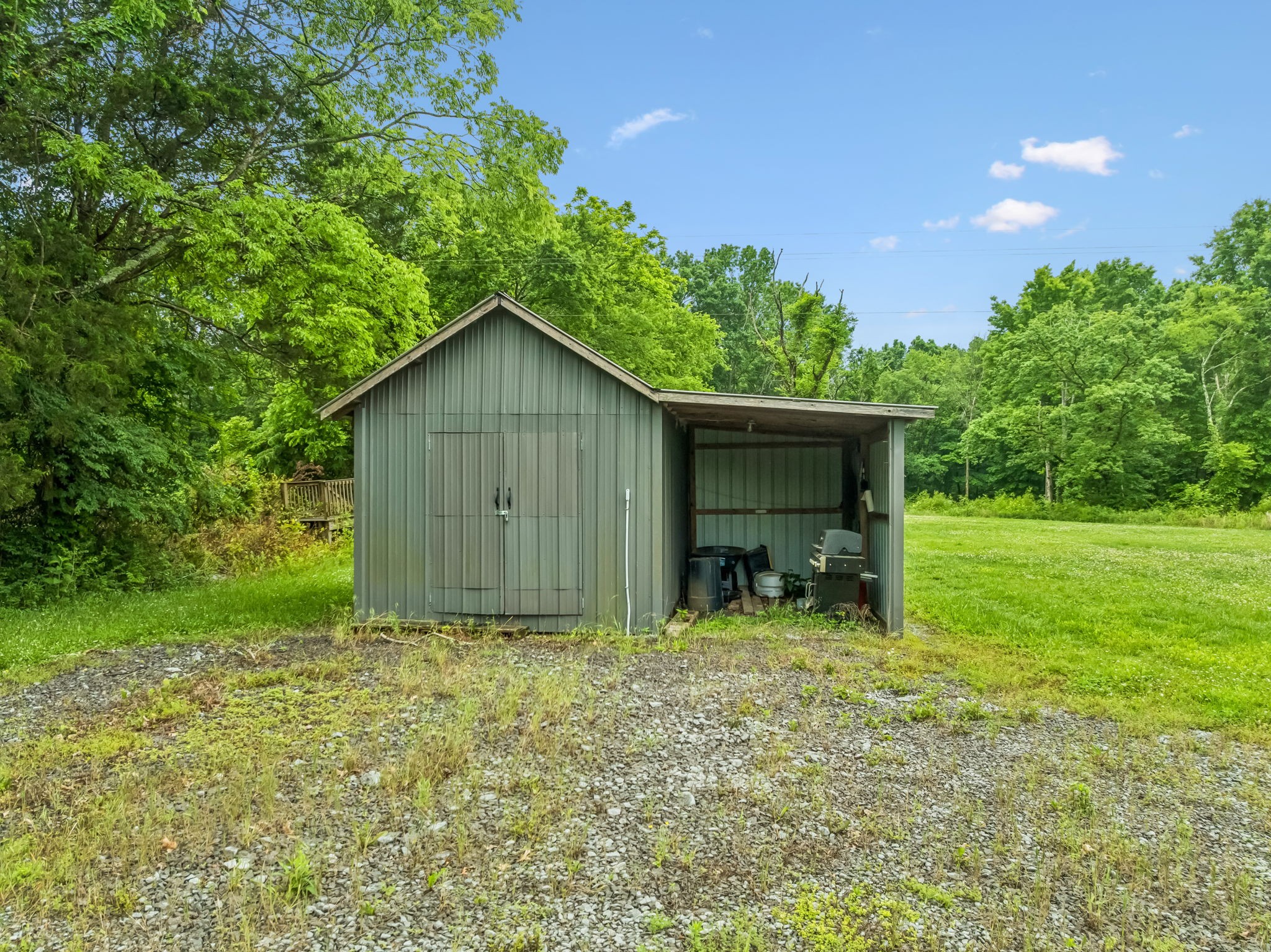 280 Kingdom Road Unionville, TN 37180 - Photo 25 of 65 a view of backyard with small cabin