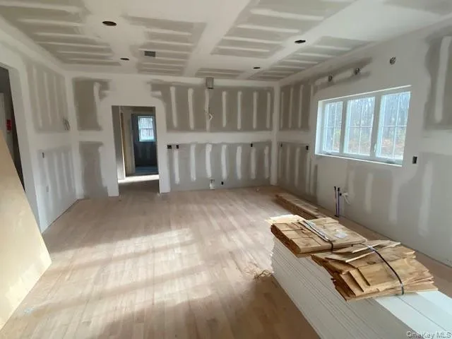 a view of a bathroom from a corridor