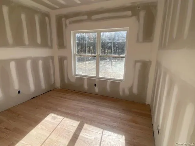 a view of a yard with tree s