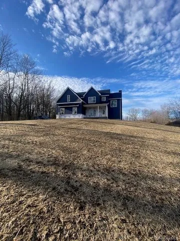 a view of a yard with a barn