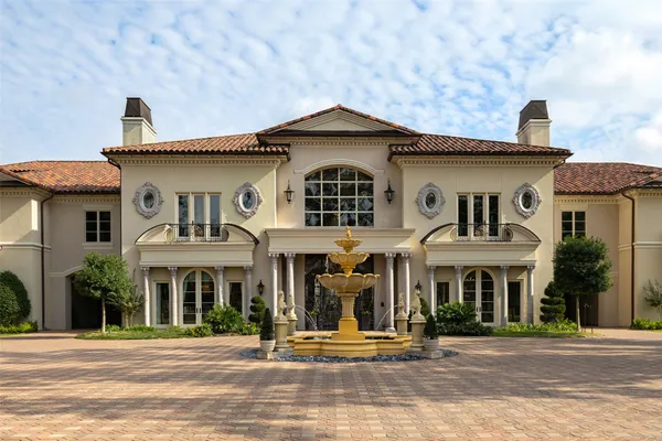 a front view of a house with a outdoor space