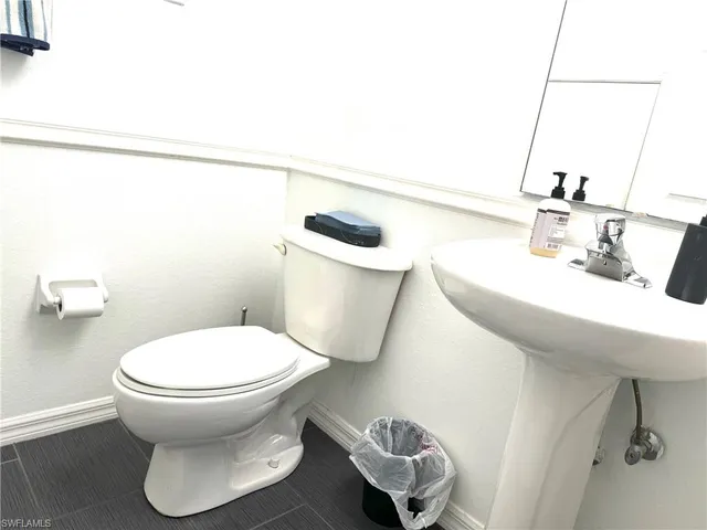 a bathroom with a sink and a toilet