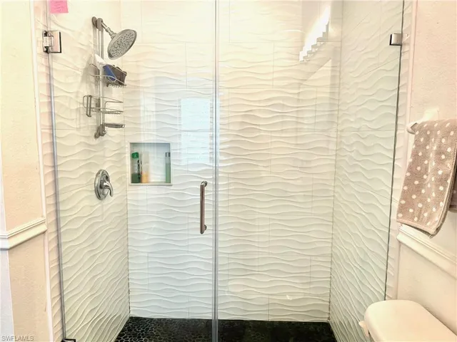 a bathroom with a sink and toilet