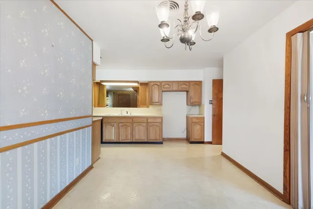 a view of a hallway with a bedroom