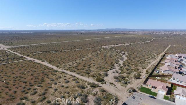 0 Luna Road Victorville, CA 92392 - Photo 2 of 9 a view of an ocean beach and mountain