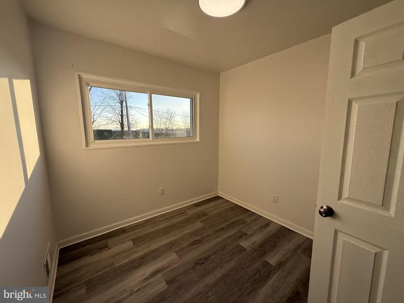 1328 W Street Northeast Washington, DC 20018 - Photo 14 of 25 a room with a window