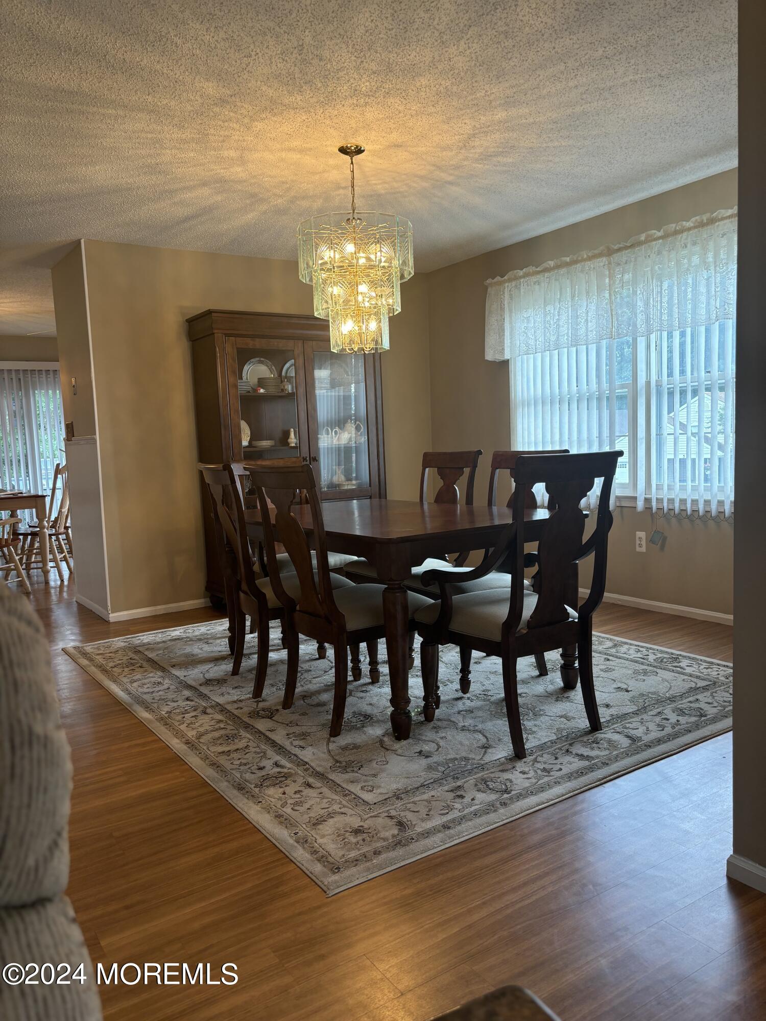 11 Springhill Drive Brick, NJ 08724 - Photo 6 of 15 a view of a dining room with furniture window and wooden floor