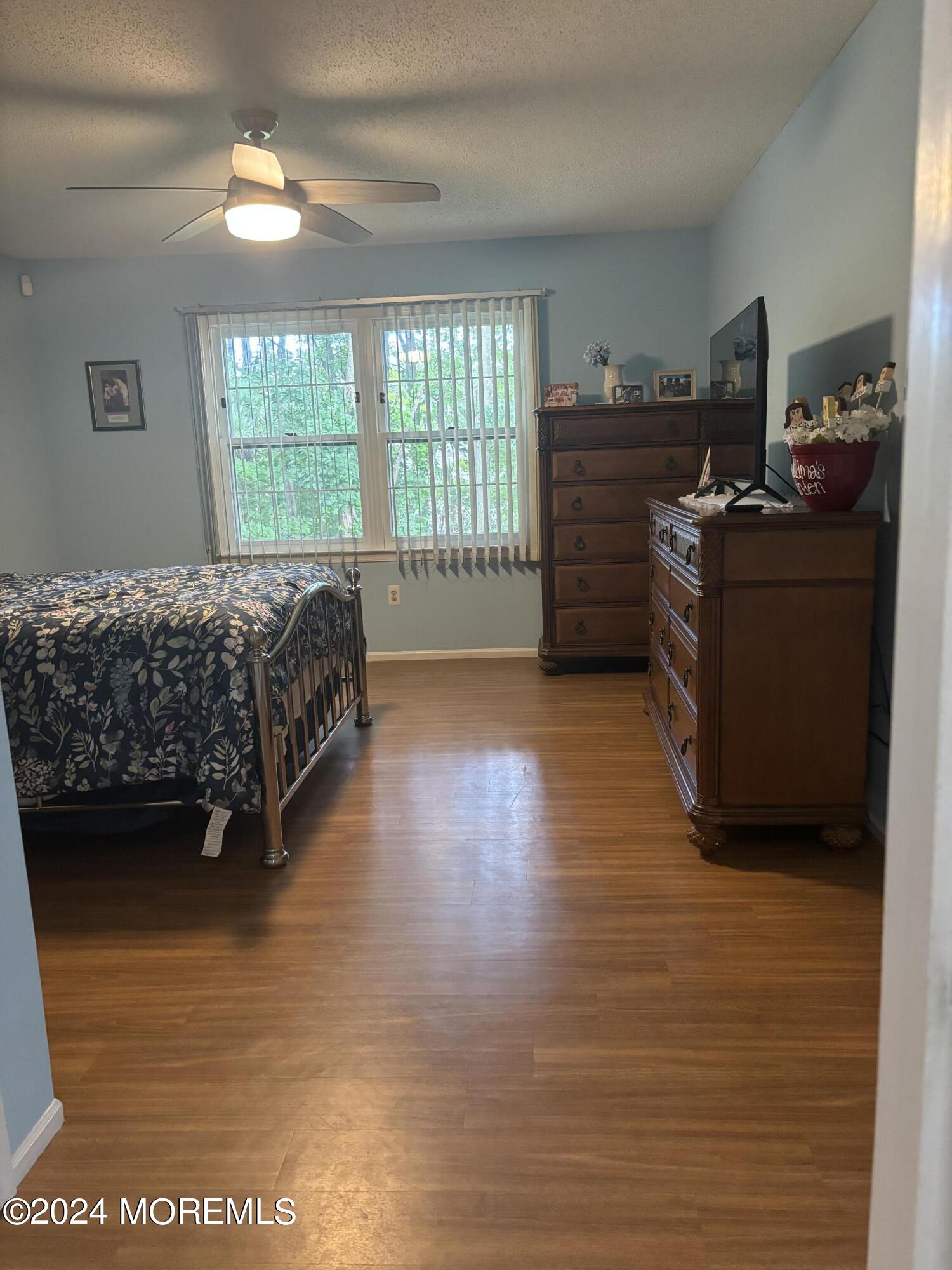 11 Springhill Drive Brick, NJ 08724 - Photo 8 of 15 a room with a bed furniture and a window