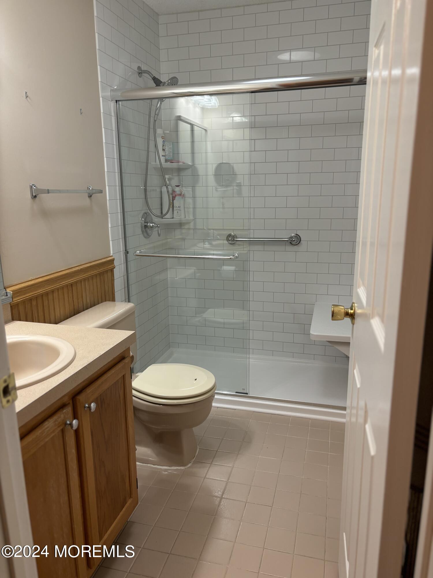 11 Springhill Drive Brick, NJ 08724 - Photo 9 of 15 a bathroom with a sink a toilet and shower
