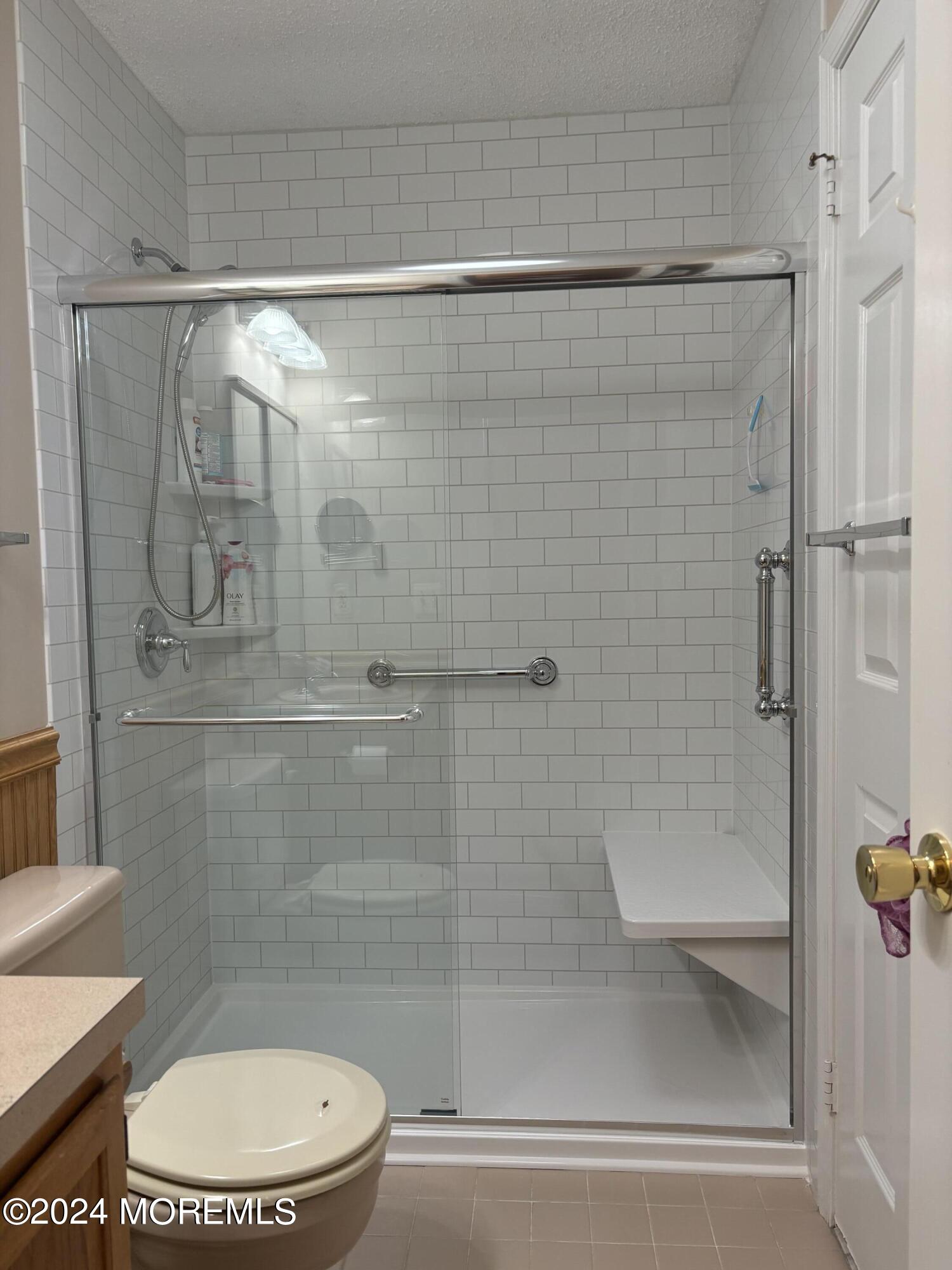 11 Springhill Drive Brick, NJ 08724 - Photo 10 of 15 a bathroom with a shower and toilet