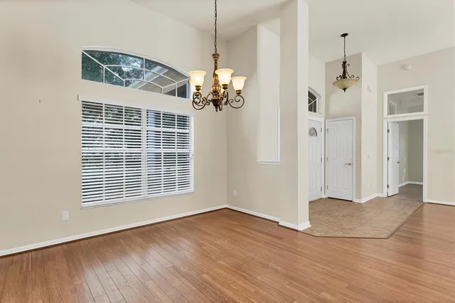 a kitchen with stainless steel appliances granite countertop a refrigerator stove and sink