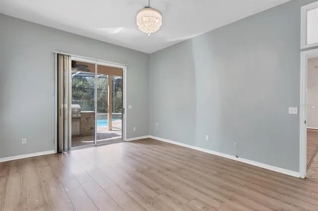 a bathroom with a tub a sink and a shower