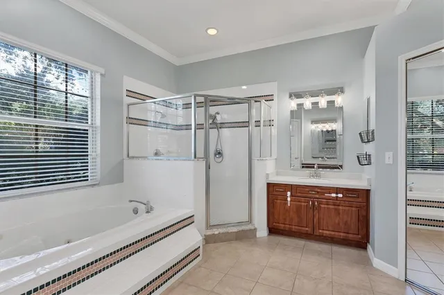 a bathroom with a granite countertop sink a toilet and a mirror