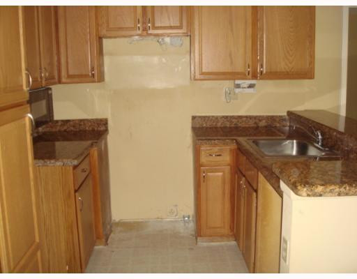 621 Lyons Road, Unit 9106 Coconut Creek, FL 33063 - Photo 2 of 6 Kitchen
