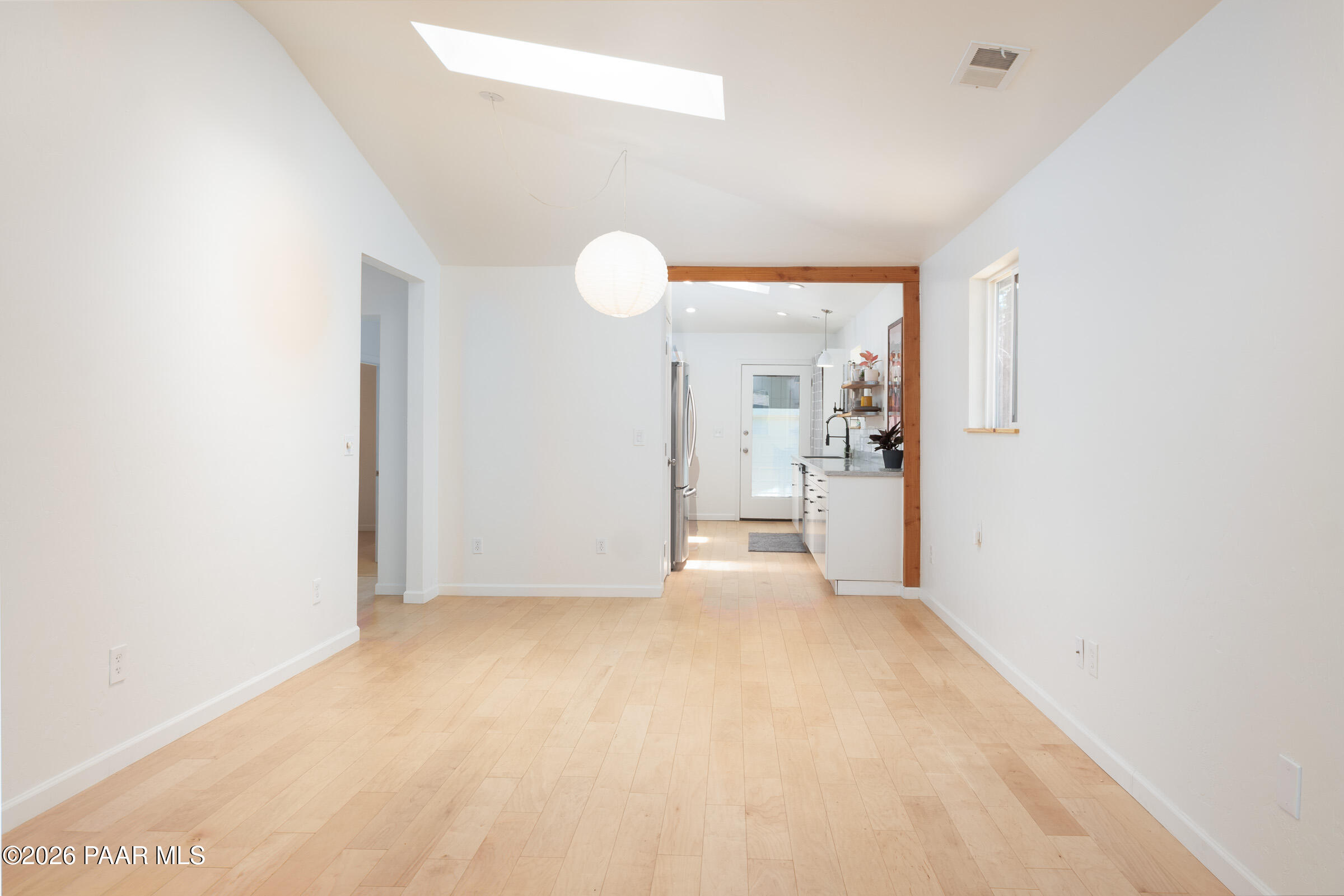 815 Ruth Street Prescott, AZ 86301 - Photo 2 of 30 a view of a big room with wooden floor and windows
