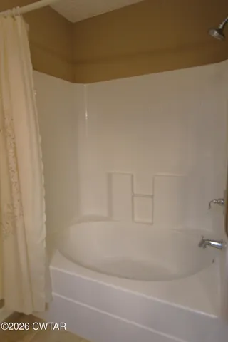 a bathroom with a bathtub
