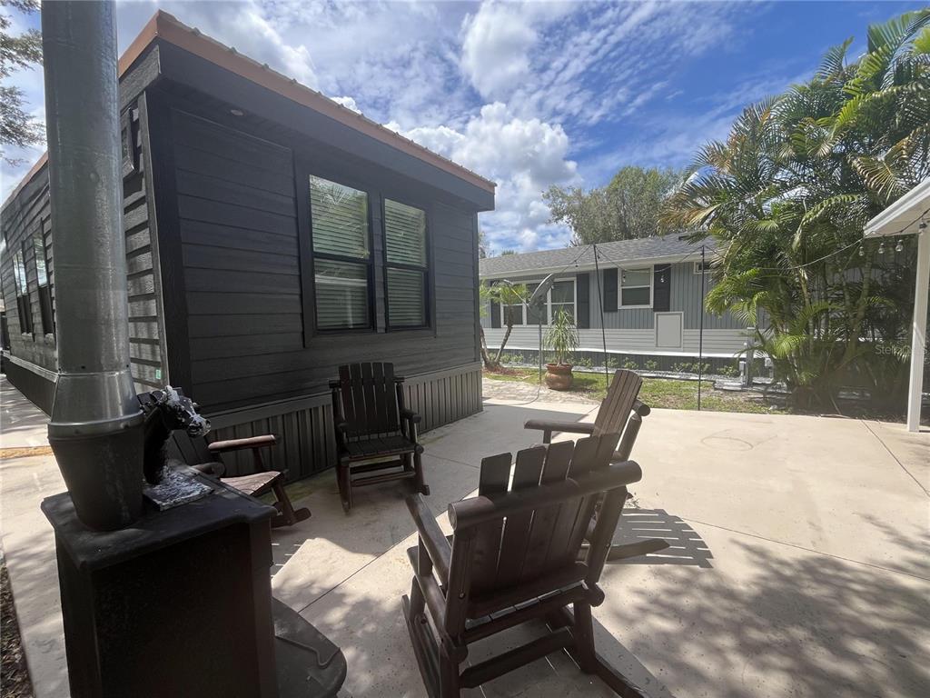 112 East Appaloosa Trail River Ranch, FL 33867 - Photo 3 of 10 a view of a house with backyard and sitting area